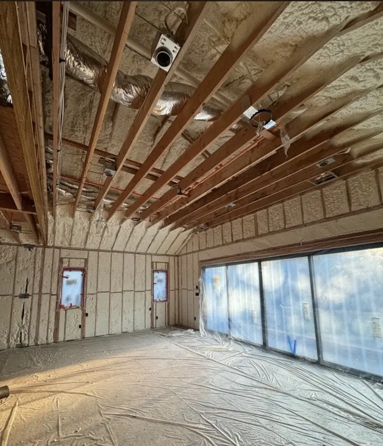 Interior walls and ceiling insulated with spray foam during new construction in Oak Creek